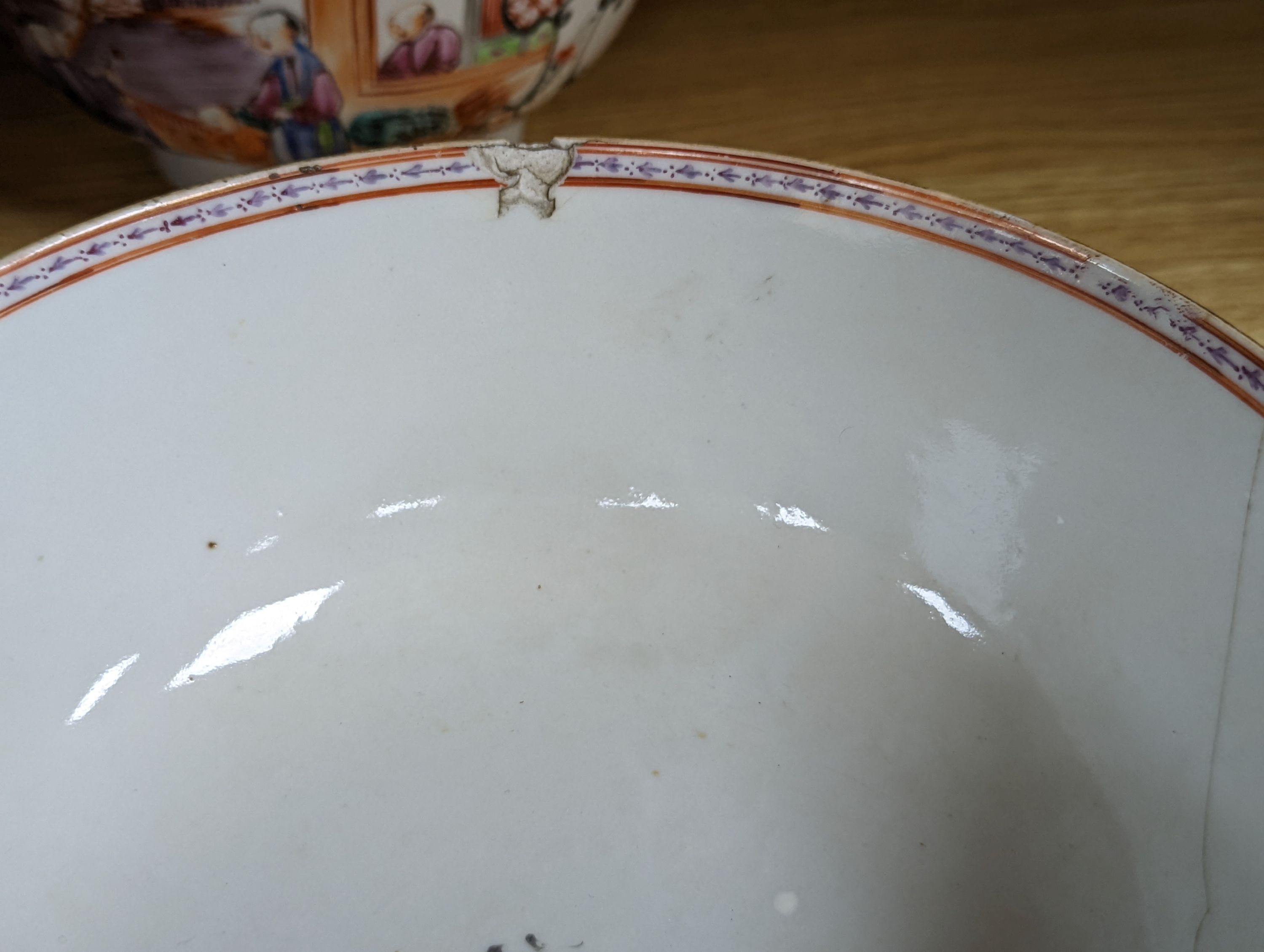 Two 18th century Chinese export bowls, a similar tea bowl and another Chinese blue and white tea bowl, largest 20cm diameter